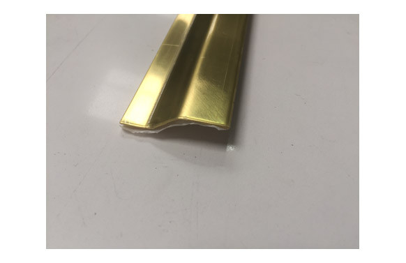 CUBREJUNTA CERAMICA PARKET LATON ADHESIVO 83 CM-40X10 MM